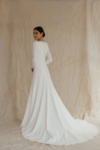 White Satin A‑Line Bateau Long‑Sleeve Button‑Back Chapel‑Train Wedding Dress For Winter