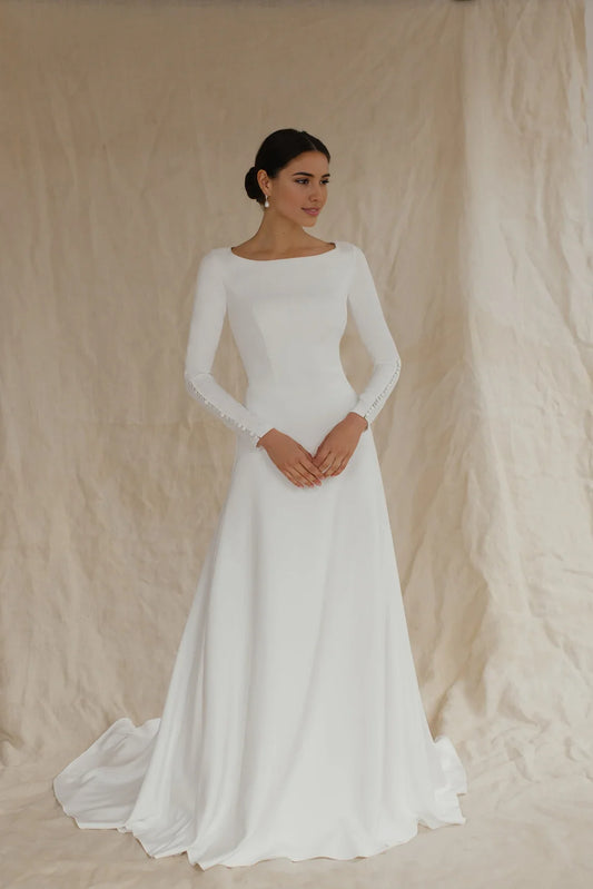 White Satin A‑Line Bateau Long‑Sleeve Button‑Back Chapel‑Train Wedding Dress For Winter