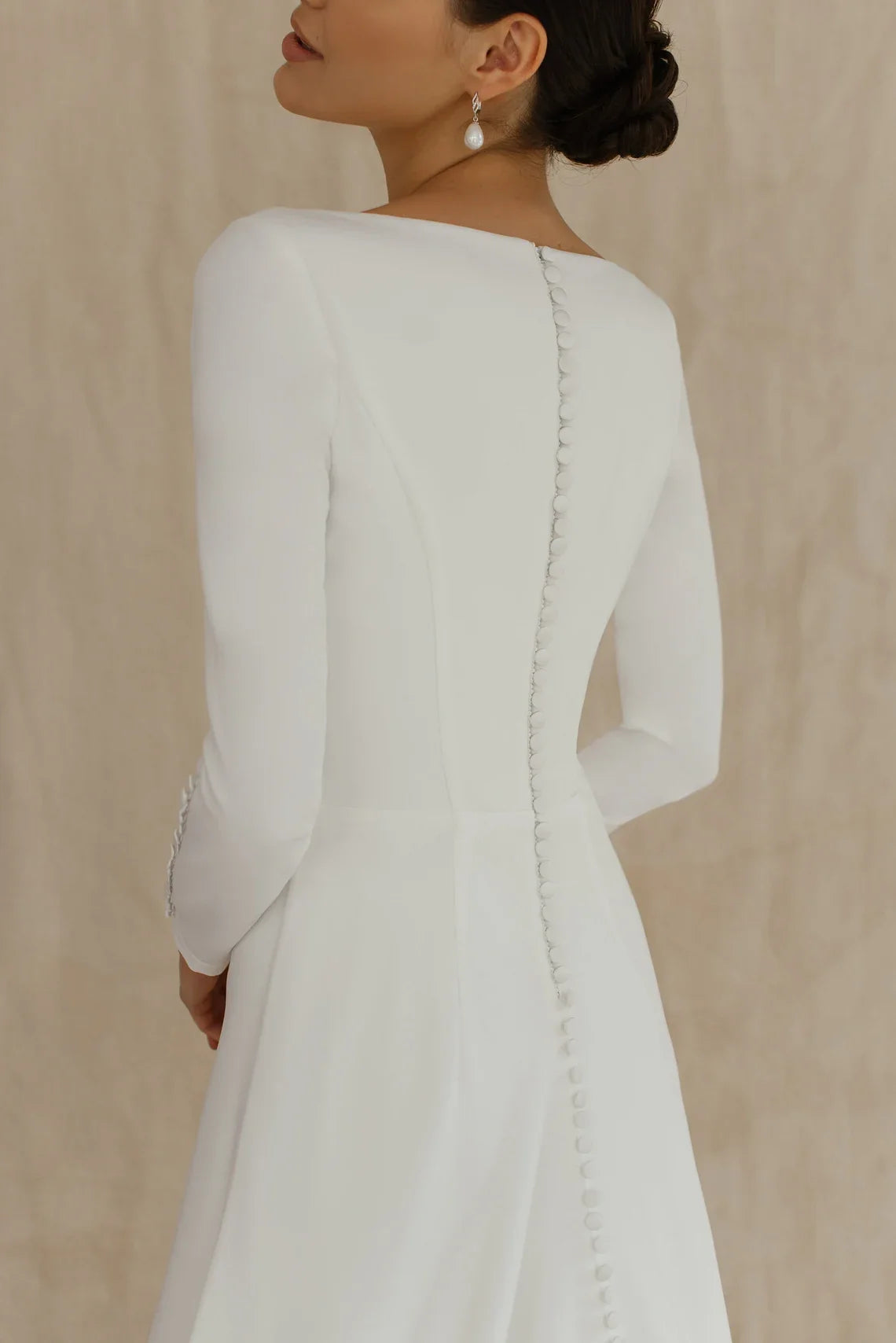 White Satin A‑Line Bateau Long‑Sleeve Button‑Back Chapel‑Train Wedding Dress For Winter