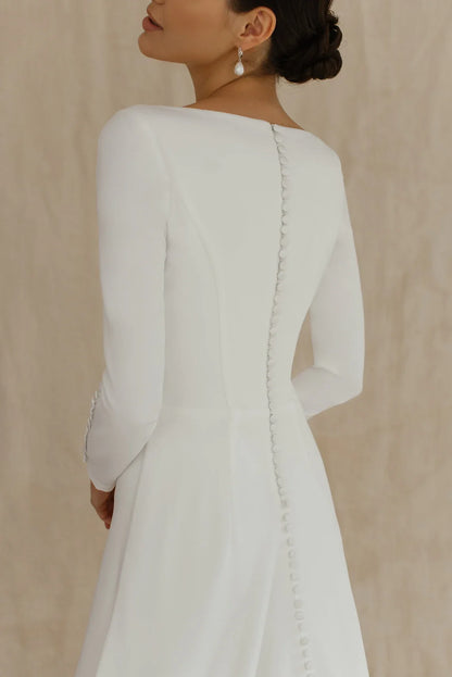 White Satin A‑Line Bateau Long‑Sleeve Button‑Back Chapel‑Train Wedding Dress For Winter