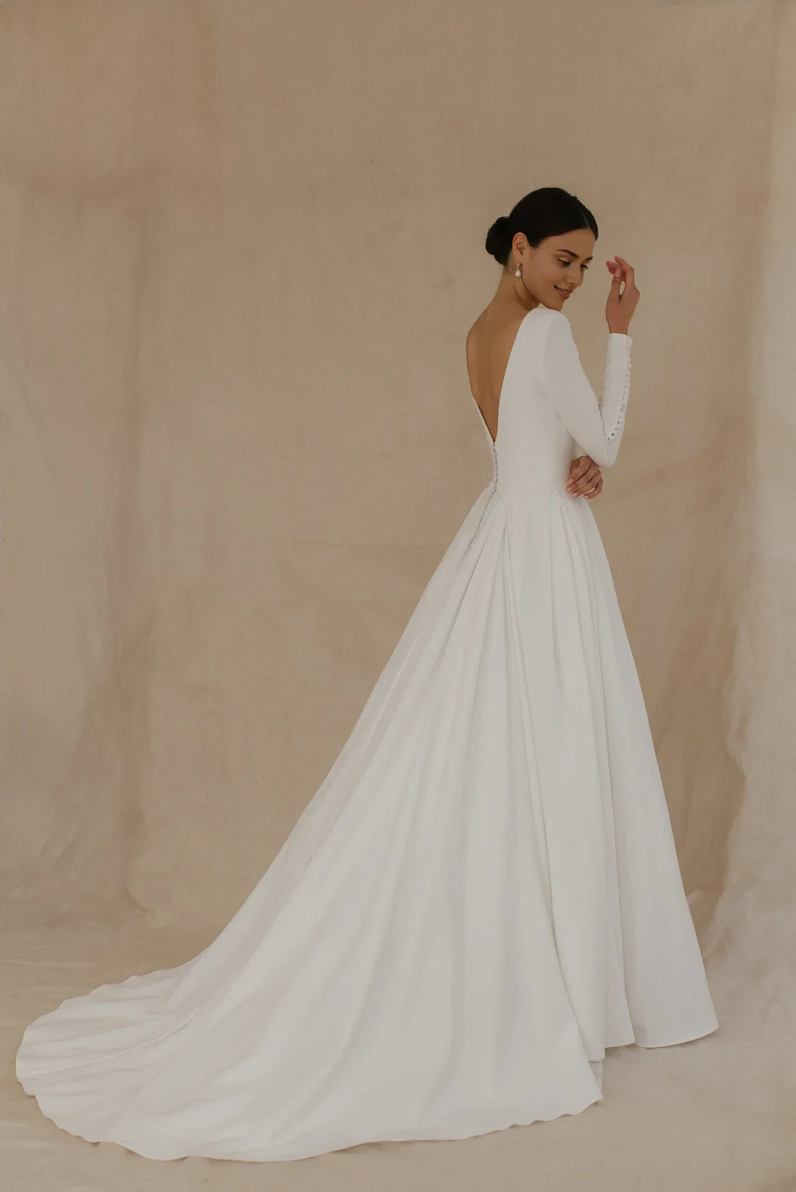 White Satin A‑Line Deep‑V Button‑Cuff Long‑Sleeve Open‑Back Chapel‑Train Wedding Dress For Church