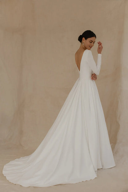 White Satin A‑Line Deep‑V Button‑Cuff Long‑Sleeve Open‑Back Chapel‑Train Wedding Dress For Church